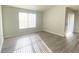 Bedroom with natural light and wood-look vinyl flooring at 5055 W Hacienda Ave # 2055, Las Vegas, NV 89118