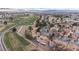 Overhead view of homes lining a golf course in a suburban community at 5328 Walton Heath Ave, Las Vegas, NV 89142