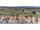 Aerial view showing homes and golf course landscape at 5328 Walton Heath Ave, Las Vegas, NV 89142
