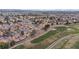 Residential area showing houses and golf course from an aerial perspective at 5328 Walton Heath Ave, Las Vegas, NV 89142
