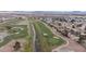 Aerial shot of residential community bordering a lush green golf course at 5328 Walton Heath Ave, Las Vegas, NV 89142