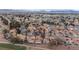 Neighborhood aerial shot near golf course with mountain views in distance at 5328 Walton Heath Ave, Las Vegas, NV 89142