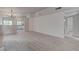 Bright living room with new wood flooring, recessed lights, and updated paint at 5328 Walton Heath Ave, Las Vegas, NV 89142