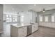 Open kitchen design with an eat-in island and lots of cabinet space at 5641 Morning Snow Ct, Las Vegas, NV 89141