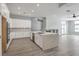 Stylish kitchen with an island, stainless appliances, and ample counter space at 5641 Morning Snow Ct, Las Vegas, NV 89141