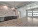 Open living room with hardwood floors, neutral walls, and recessed lighting at 5641 Morning Snow Ct, Las Vegas, NV 89141