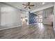 Bright and open living space with hardwood floors, stylish accents, and ample natural light at 5641 Morning Snow Ct, Las Vegas, NV 89141