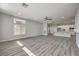 Bright and spacious living room featuring hardwood floors and an open floor plan at 5641 Morning Snow Ct, Las Vegas, NV 89141