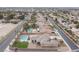 Aerial view of a home with a large lot, pool, and many mature trees at 5815 Pristine Falls Ave, Las Vegas, NV 89131