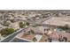 This home features a backyard oasis with sparkling pool and desert landscaping at 5815 Pristine Falls Ave, Las Vegas, NV 89131