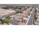 This home offers desert landscaping, secure fencing, and a sparkling pool, perfect for outdoor living at 5815 Pristine Falls Ave, Las Vegas, NV 89131