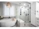 Modern bathroom with soaking tub, separate shower, and stylish finishes in a bright and airy space at 5815 Pristine Falls Ave, Las Vegas, NV 89131