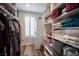 Organized closet with shelves and hanging storage at 5815 Pristine Falls Ave, Las Vegas, NV 89131