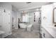 Beautiful ensuite bathroom with soaking tub, glass shower, double vanity, and modern fixtures at 5815 Pristine Falls Ave, Las Vegas, NV 89131