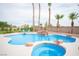 Beautiful backyard pool with waterfall feature, spa and desert landscaping in a private setting at 5815 Pristine Falls Ave, Las Vegas, NV 89131