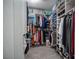 Spacious walk-in closet with ample hanging space and shelving for clothes and accessories at 5815 Pristine Falls Ave, Las Vegas, NV 89131