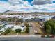 Aerial view of the property, displaying the neighborhood and mountain views at 5906 Bunch St, Las Vegas, NV 89122