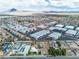 Aerial shot of a neighborhood featuring industrial buildings and a flat parcel at 5906 Bunch St, Las Vegas, NV 89122