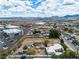 Aerial view of the property, featuring surrounding residential homes and local businesses at 5906 Bunch St, Las Vegas, NV 89122