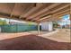 Covered patio perfect for entertaining, offering shade and a spacious brick paved area at 5906 Bunch St, Las Vegas, NV 89122