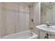 Compact bathroom featuring a shower/tub combo, and a sink with traditional fixtures at 5906 Bunch St, Las Vegas, NV 89122