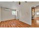 Comfortable bedroom with wood floors, ceiling fan, and mini split at 5906 Bunch St, Las Vegas, NV 89122
