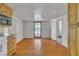 Light and airy dining area boasts wood floors and outdoor access at 5906 Bunch St, Las Vegas, NV 89122