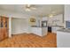 Updated kitchen featuring white cabinets, granite countertops, and modern appliances at 5906 Bunch St, Las Vegas, NV 89122