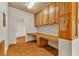 Dedicated home office featuring custom built-in desk and wood cabinetry at 5906 Bunch St, Las Vegas, NV 89122