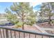 Scenic view from the balcony showcasing mature trees, landscaping, and parking at 601 Cabrillo Cir # 754, Henderson, NV 89015