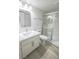 Clean bathroom with a glass-enclosed shower, marble vanity, and new fixtures at 601 Cabrillo Cir # 754, Henderson, NV 89015