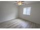 Clean, bright bedroom with hardwood flooring and a ceiling fan at 601 Cabrillo Cir # 754, Henderson, NV 89015