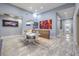 Hallway featuring a bar, modern chandelier, and access to the dining area at 6103 Stone Rise St, Las Vegas, NV 89135
