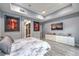Stylish main bedroom featuring a serene color palette, modern furnishings, and ample natural light at 6103 Stone Rise St, Las Vegas, NV 89135