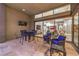 Enjoy outdoor living on this patio with sleek tile, multiple seating areas, and seamless indoor-outdoor flow at 6103 Stone Rise St, Las Vegas, NV 89135