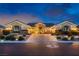Stunning home showcasing a brick driveway, manicured landscaping, and decorative exterior lighting at 6373 Bridal Cave Ave, Las Vegas, NV 89131