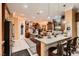 Spacious kitchen featuring granite countertops, pendant lighting, and stainless steel appliances at 6373 Bridal Cave Ave, Las Vegas, NV 89131