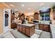Well-equipped kitchen boasting granite countertops, custom cabinets and a functional island at 6373 Bridal Cave Ave, Las Vegas, NV 89131