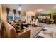 Open-concept living room featuring hardwood floors and great natural light at 6373 Bridal Cave Ave, Las Vegas, NV 89131