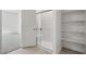 Modern bathroom featuring glass shower and storage shelves at 6755 Violet Cascade Ave, Las Vegas, NV 89156