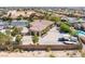 View shows a large lot with a single Gathering home with RV parking, Desert landscape and walled property at 7687 W Pebble Rd, Las Vegas, NV 89113
