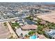Overhead view of a custom home with a pool, recreational area, and ample parking, nestled in a vibrant community at 7687 W Pebble Rd, Las Vegas, NV 89113