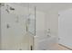 Bathroom with a glass-enclosed shower and separate soaking tub provides a relaxing space at 7901 Idledale Ct # 102, Las Vegas, NV 89145