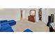 Bedroom with a dresser and adjacent closet offering plenty of storage space on neutral carpet at 7901 Idledale Ct # 102, Las Vegas, NV 89145
