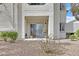 Exterior view of a well-maintained condo with private patio and landscaped surroundings at 7901 Idledale Ct # 102, Las Vegas, NV 89145