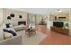 Inviting living room with fireplace, neutral colors, and a sliding glass door with outside access at 7901 Idledale Ct # 102, Las Vegas, NV 89145