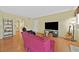 Bright living room featuring laminate floors and comfortable seating at 7901 Idledale Ct # 102, Las Vegas, NV 89145