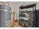 Functional storage room with water heater, shelving units and ample space for storage solutions at 7901 Idledale Ct # 102, Las Vegas, NV 89145