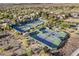 Extensive tennis facilities viewed from above, set in a desert-like environment at 9 Greely Club Trl, Henderson, NV 89052