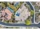 Aerial view showcasing the home, pool and surrounding neighborhood at 9 Greely Club Trl, Henderson, NV 89052